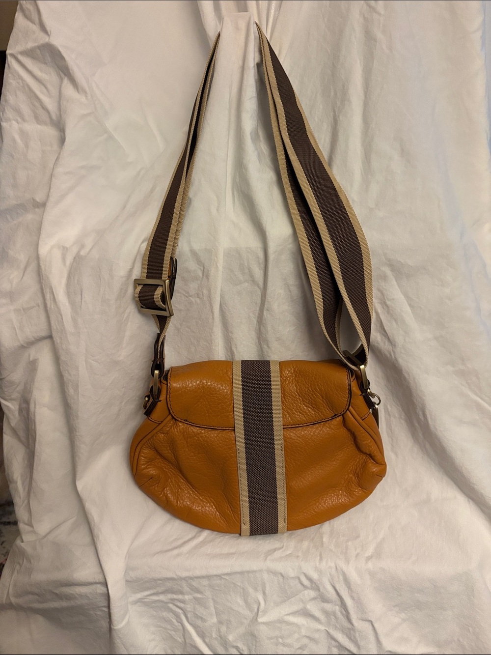 Folli Follie | Leather Saddle Crossbody Bag in Tan with Striped Strap - Picture 2 of 3